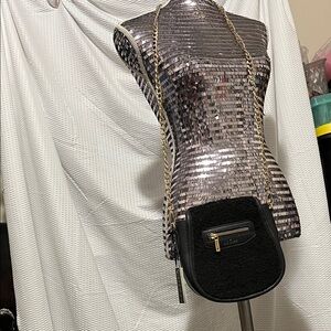 Chic Black Crossbody Bag with Gold Accents